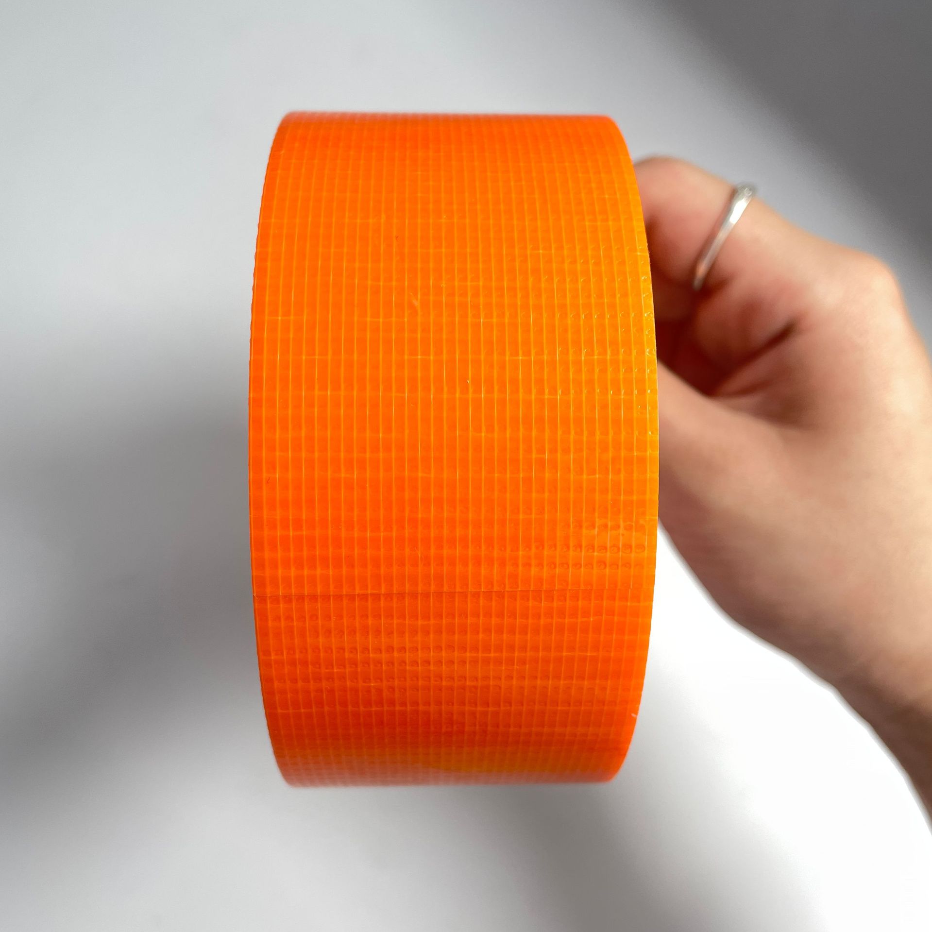 Tape adhesiva de tela de alta viscosidad decoración sin rastro película adhesiva de tela de malla adhesiva de tela unilateral cinta adhesiva de tela