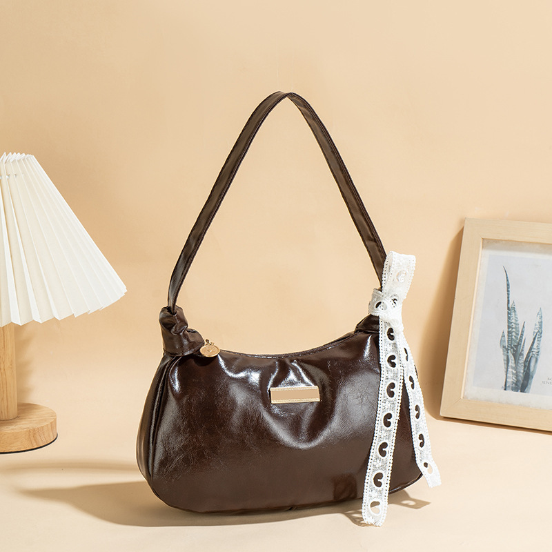 Bolso de cuero PU suave de cuero de aceite 2025 nueva moda universal bolso de moda de mujer bolso de brazo portátil pequeño