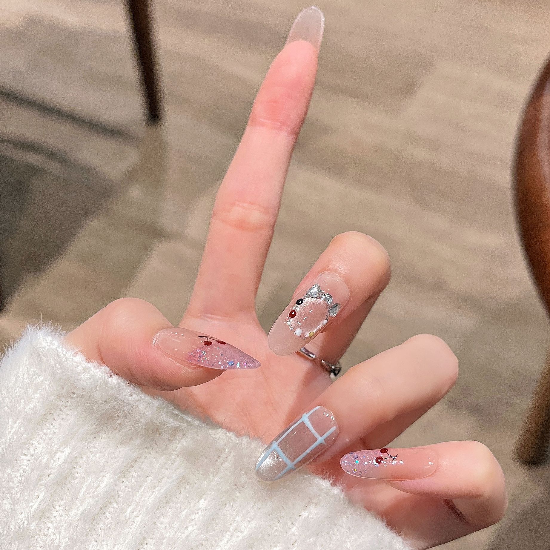 Otoño y invierno nuevos ojos de gato para usar uñas pintadas a mano adorables parches de uñas falsas de tamaño medio y largo productos terminados desmontables de uñas