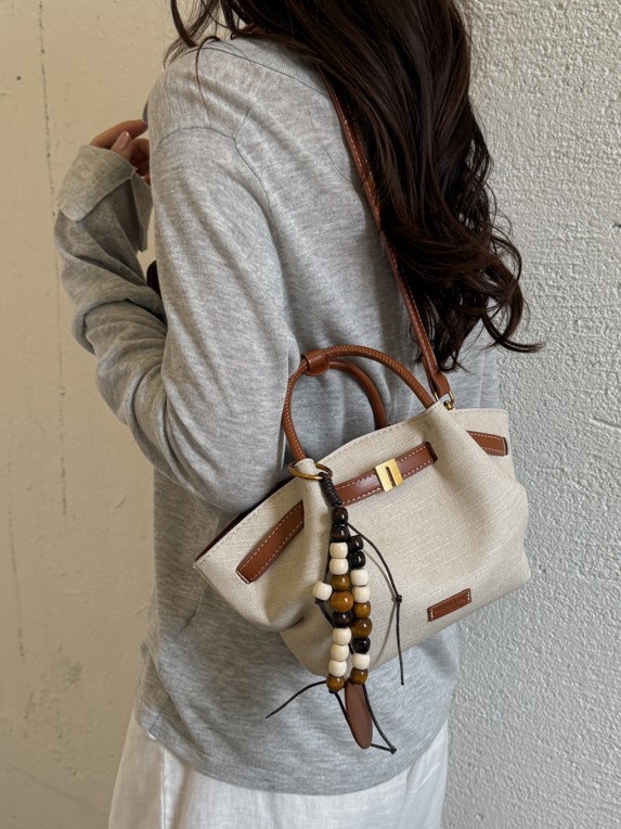 Nicho coreano bolsas de mano tote mujeres 2026 comercio exterior nuevo relajado sensación universal hombro mochila canasta de verduras