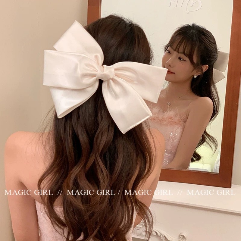 ピンクのサテンデザインの大きなリボンスプリングクリップヘアピンスーパー妖精韓国スタイルハーフタイヘアピンハイエンドヘアアクセサリー|undefined