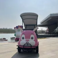 Электромобиль XT Xiangtu Electric New Pink Rabbit — 4-местный экскурсионный автомобиль для туристических поездок по живописным местам с аудиосистемой для использования на открытом воздухе.