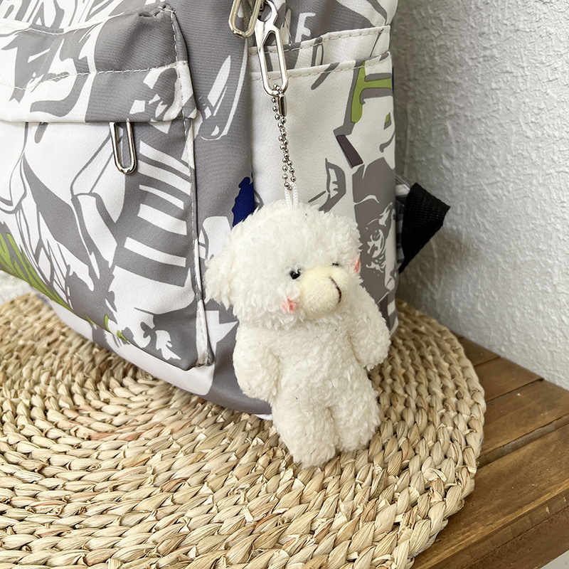 Moda mochila bolsa ins personalizado impreso graffiti estudiante universitario mochila de nylon moda casual todo a juego mochila para mujeres