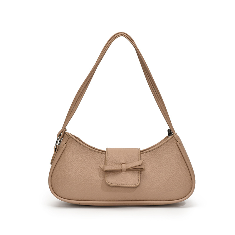 Versión coreana del bolso de axila de nicho 2025 primavera y verano nuevo bolso femenino lindo bolso de lazo bolso de hombro diario