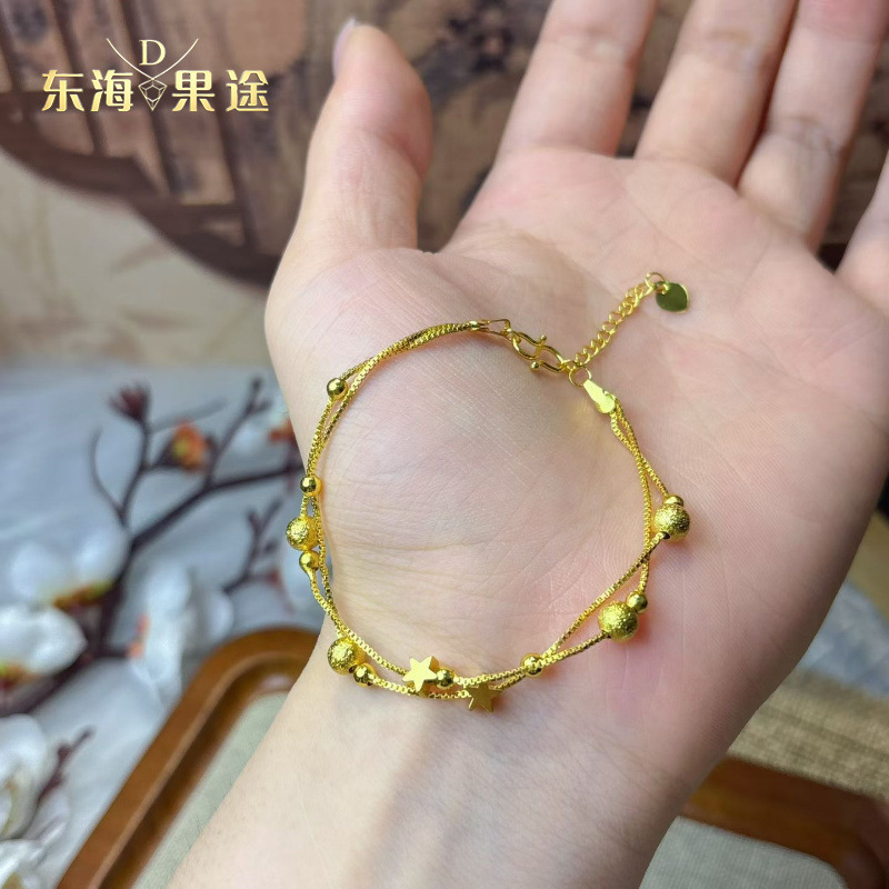 Real gold-plated, strong color retention, antique-style sand gold frosted small gold ball and star double-layer bracelet, fashionable, light luxury, high-end collarbone chain Real gold-plated, strong color retention, antique-style sand gold frosted small gold ball and star double-layer bracelet, fashionable, light luxury, high-end collarbone chain