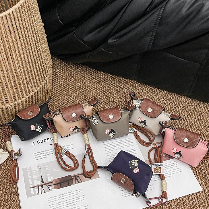Mini cute women's bag, niche design, dumpling bag, coin purse, lipstick, earphone bag, keychain, bag charm, croissant bag