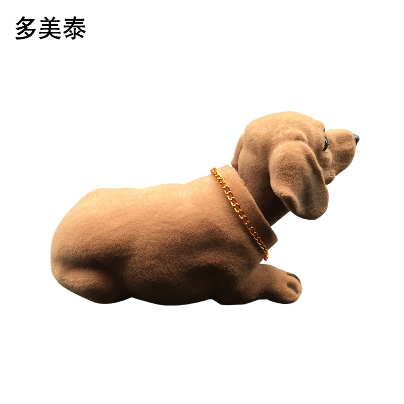 Suministro directo de fábrica resina flocado simulación salchicha perro cabeza móvil perro decoración del coche accesorios del coche simulación perro Decoración