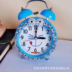 3インチの猫の金属のベルを鳴らす学生は目覚まし時計の水で静かなベッドの頭の時計の創意的な家庭装飾の飾り物を使います。