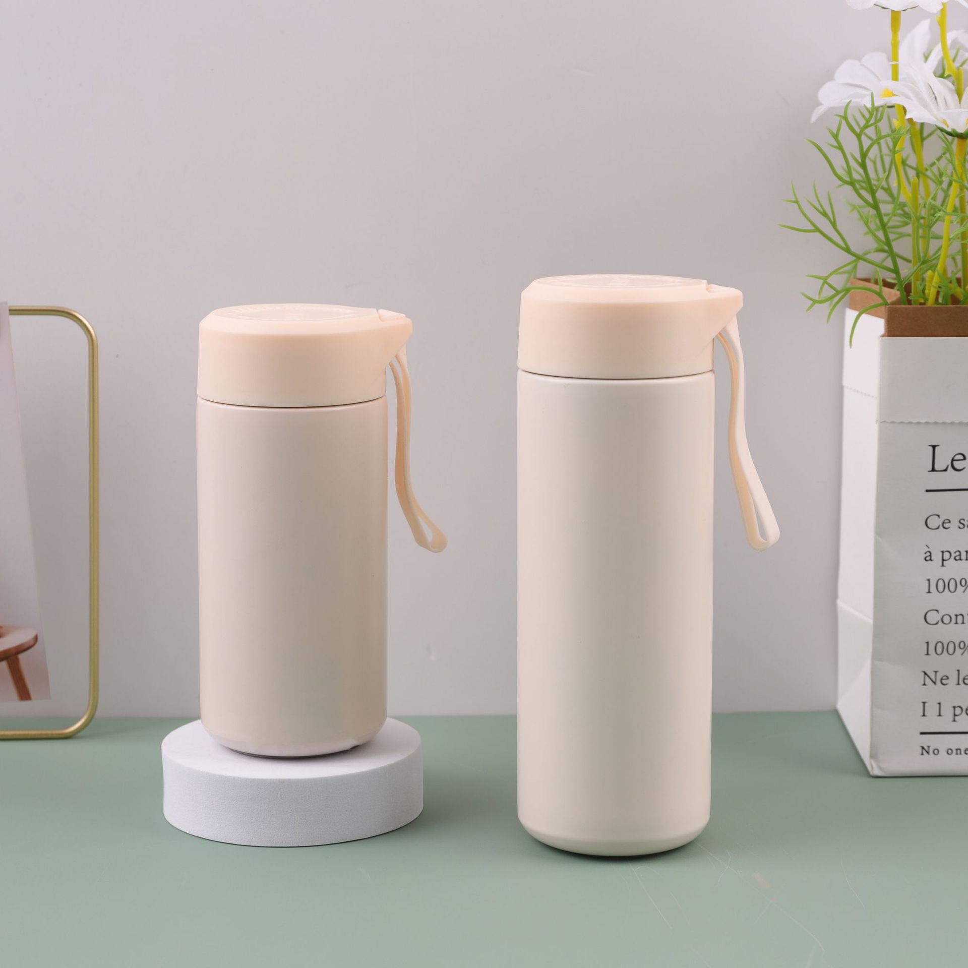 Moda simple 304 taza de acero inoxidable portátil cuerdas taza de agua al aire libre mini taza de bolsillo taza de regalo al por mayor