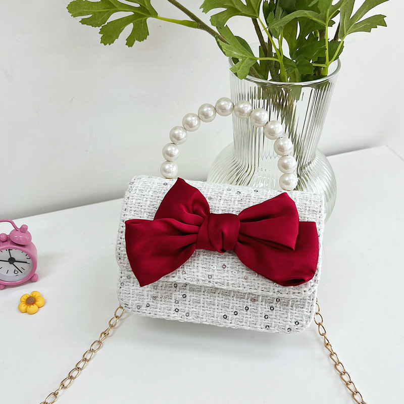 Bolsos infantiles, bolsos de arco, bolsos de moda, bolsos de princesa, bolsos de hombro para niñas, bolsos de cambio para reducir la carga