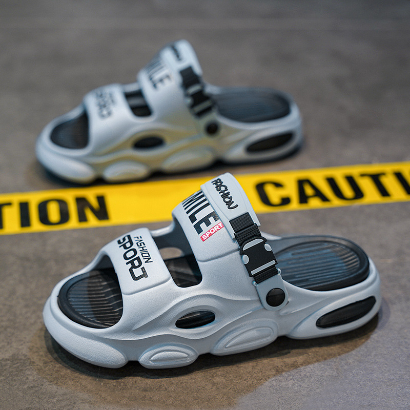 Zapatillas de un solo carácter para hombre 2025 uso exterior de verano suela gruesa pisando mierda, deportes de playa, sandalias de doble uso para conducción, mujeres transfronterizas