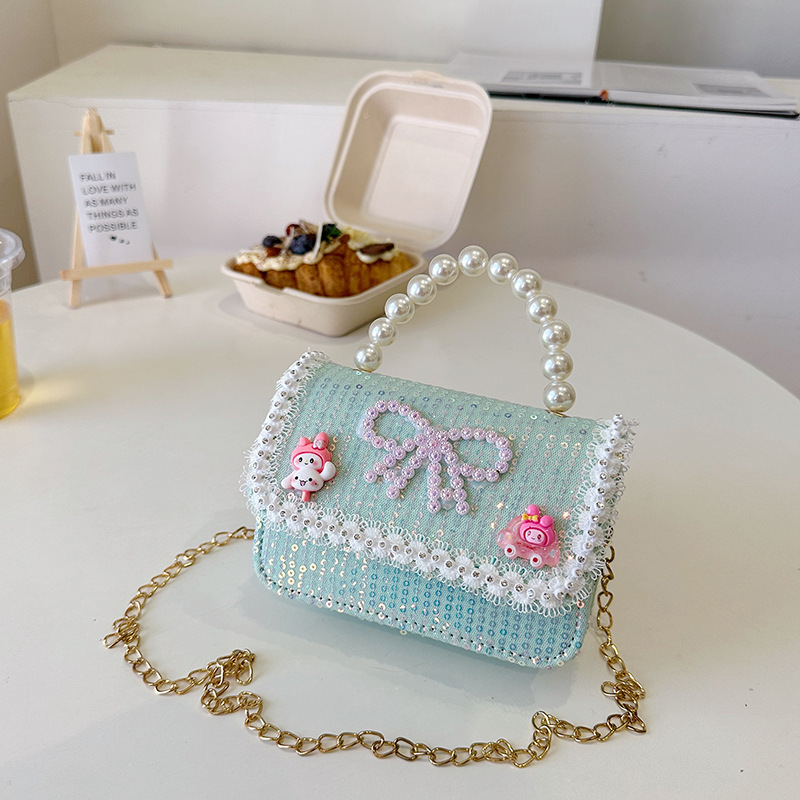 2025 nuevo lindo arco princesa bolsa de perlas portátil moda versátil mochila de hombro bolso de cambio coreano