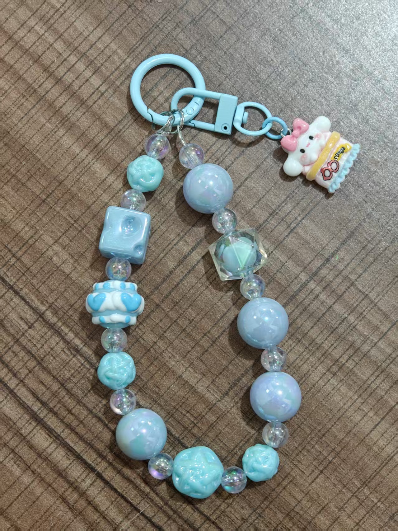 Nuevo colgante de cadena de teléfonos móviles de dibujos animados palomitas de maíz colgante de llavero creativo colgante de bolsas de perlas pintadas a mano