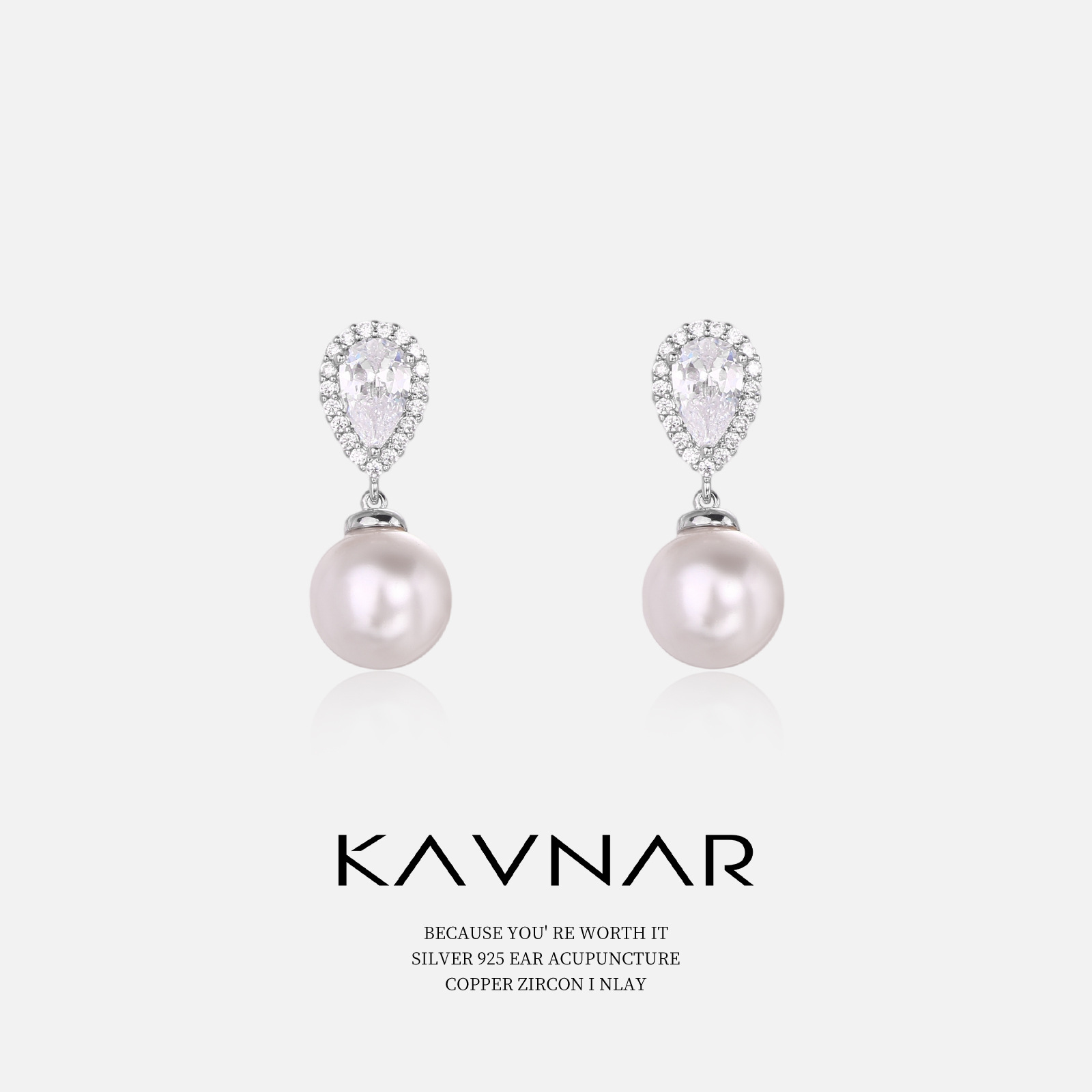 Elegant fashionable earrings drop-shaped with zircon from pearl