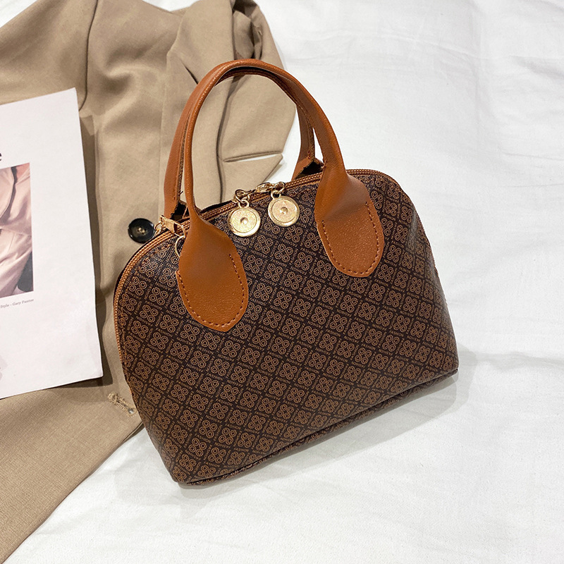 Bolso de comercio exterior transfronterizo mujer 2022 moda coreana impresión de hombro mochila bolso de mujer bolso de teléfono móvil al por mayor