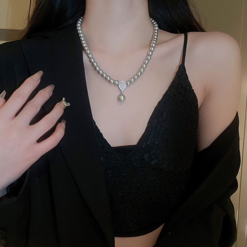 Collar de perlas con lazo de flor con cuentas francesas Elegante cadena de clavícula con sentido de alta gama retro ligero decoración de lujo femenino