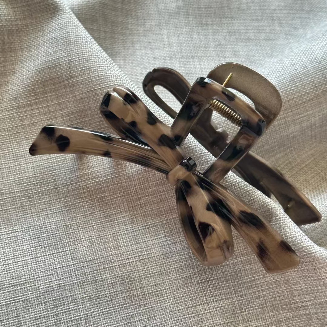 Light brown leopard print bow