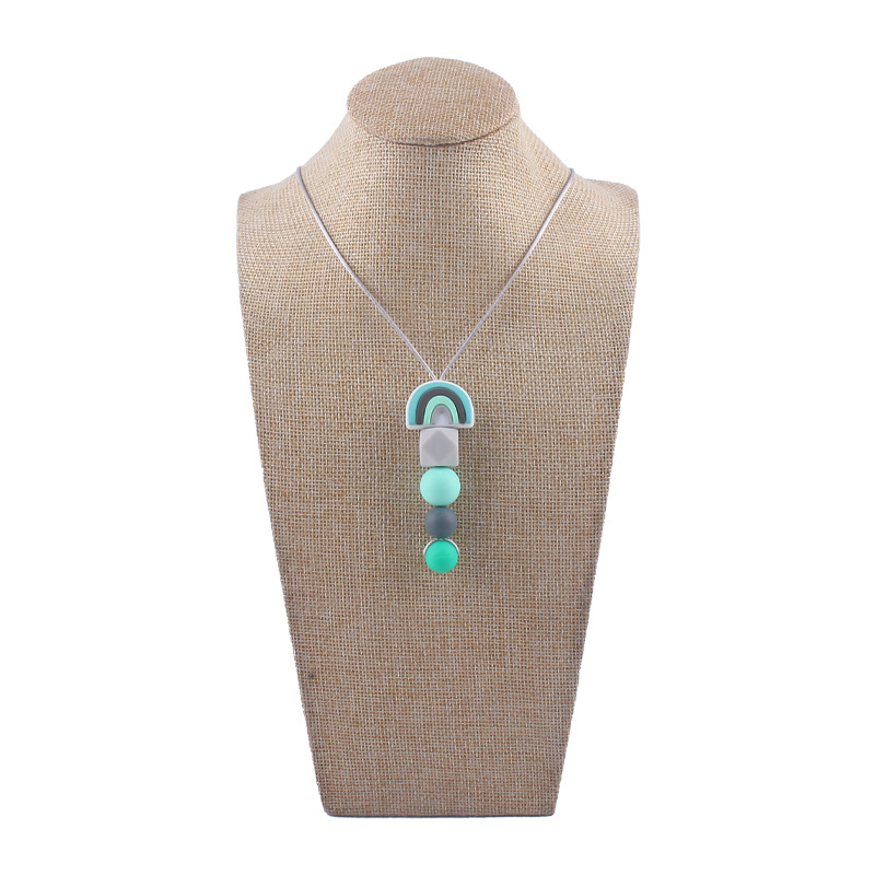 Bebé molar mordedor perlas colgante masticable colgante accesorios de ropa para niños de dibujos animados Arco Iris colgante collar mordedor