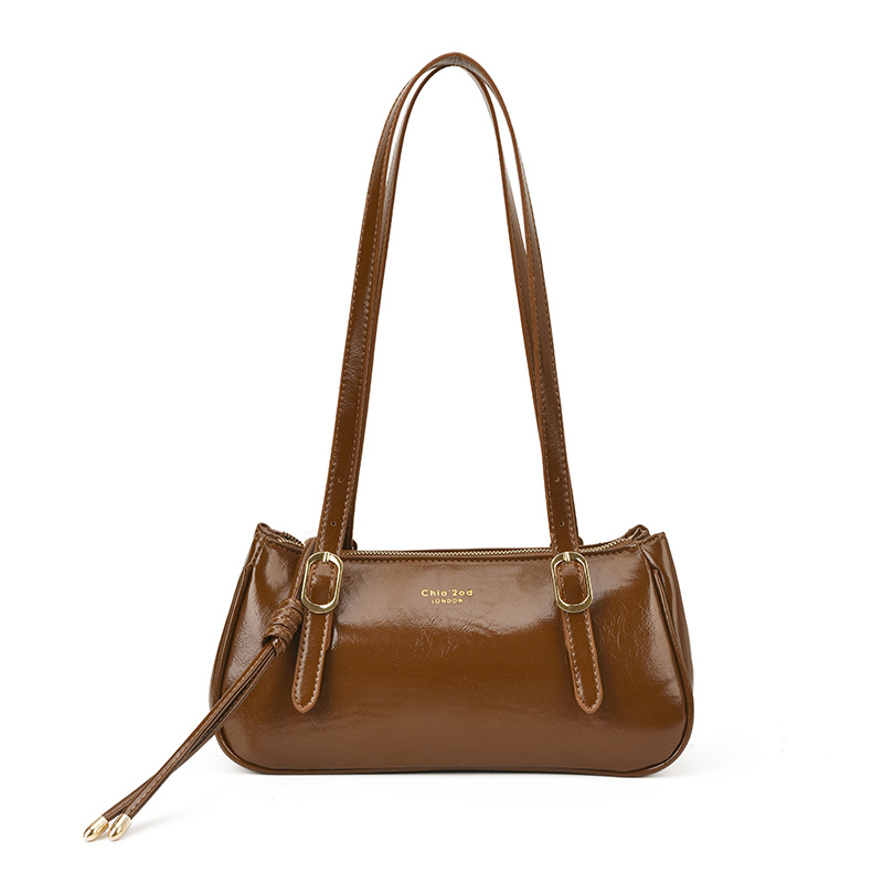 Bolsa de almohada portátil retro transfronteriza para mujeres otoño / invierno 2025 nuevo tipo de alta calidad de viaje a la axila bolso de hombro universal