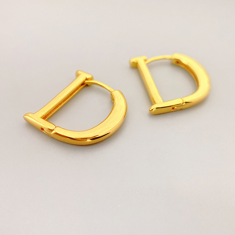 fashionable glossy earrings with letters