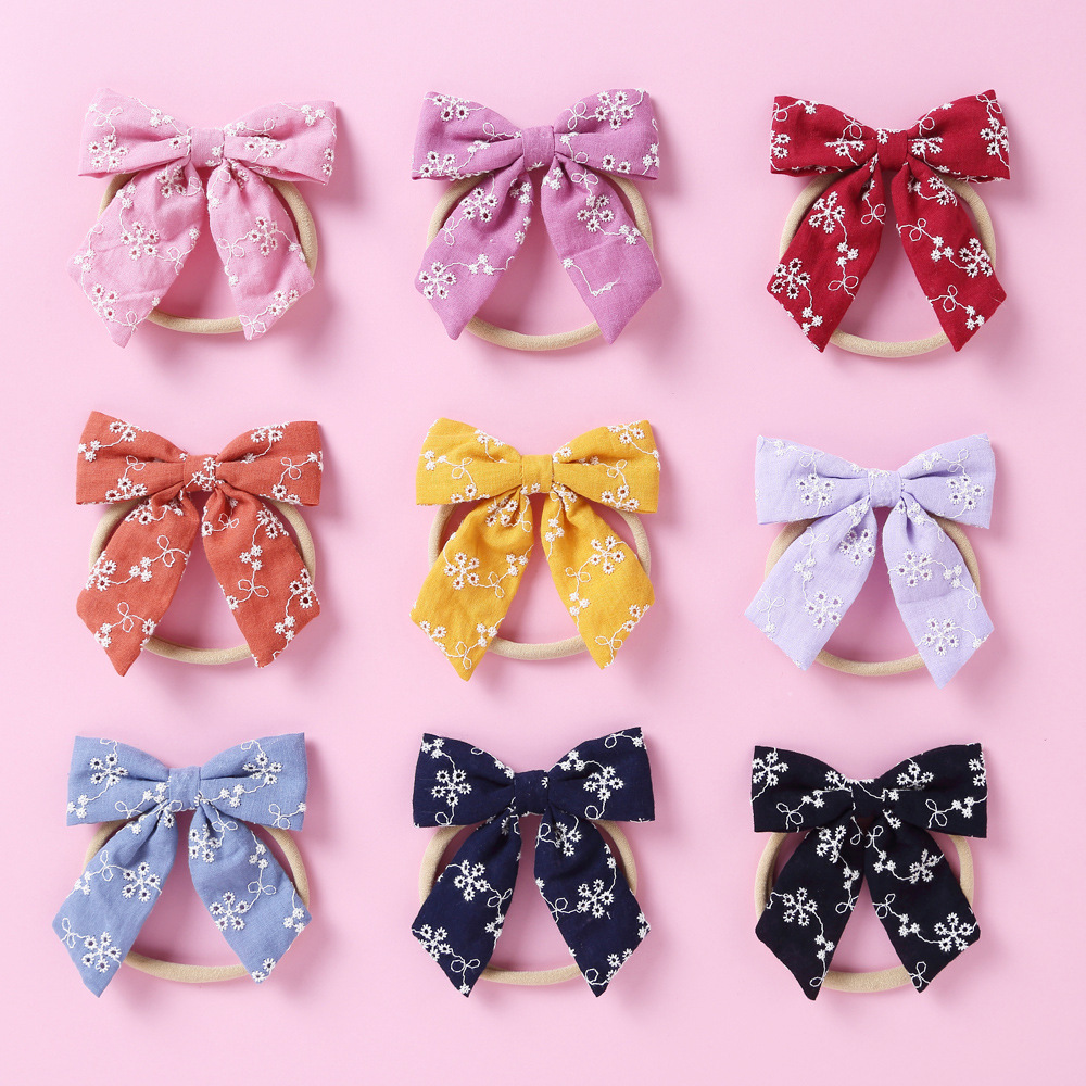 Spring New Baby Fabric Soft Nylon Bow Machine Embroidered Cotton Headband display picture 1