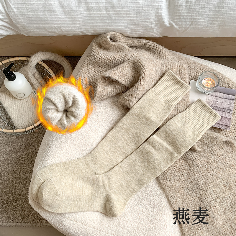 Calcetines de mujer invierno engrosado calcetines de oveja invierno calcetines de calcetines de mujer al por mayor