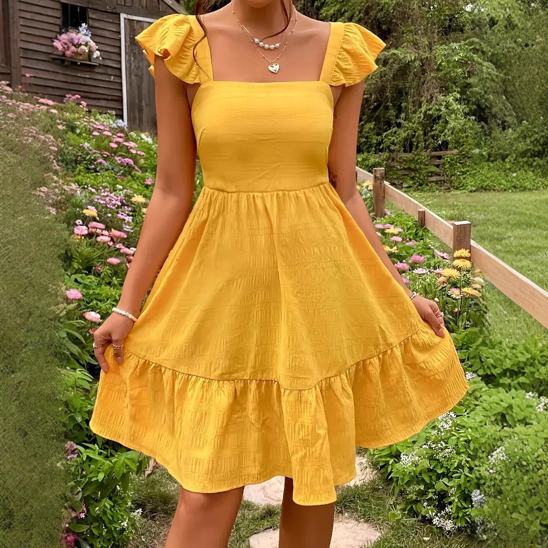 2025纯色系带荷叶边连衣裙女欧美夏季街头风露背吊带裙甜美短裙