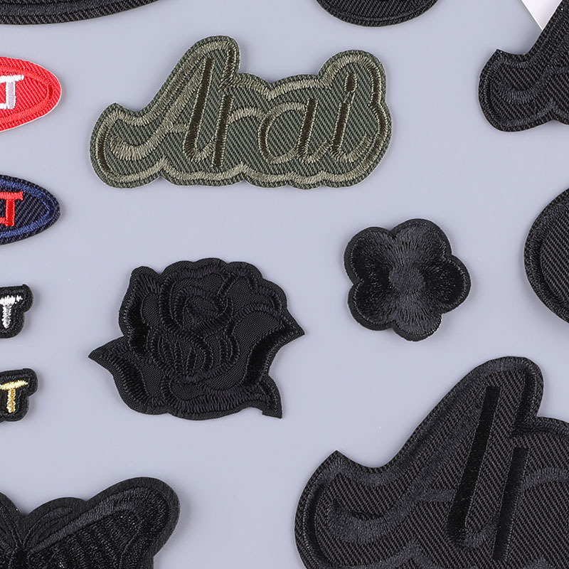 服装辅料刺绣字母布标羽绒服破洞修补小补丁贴电脑绣花标章仔布贴