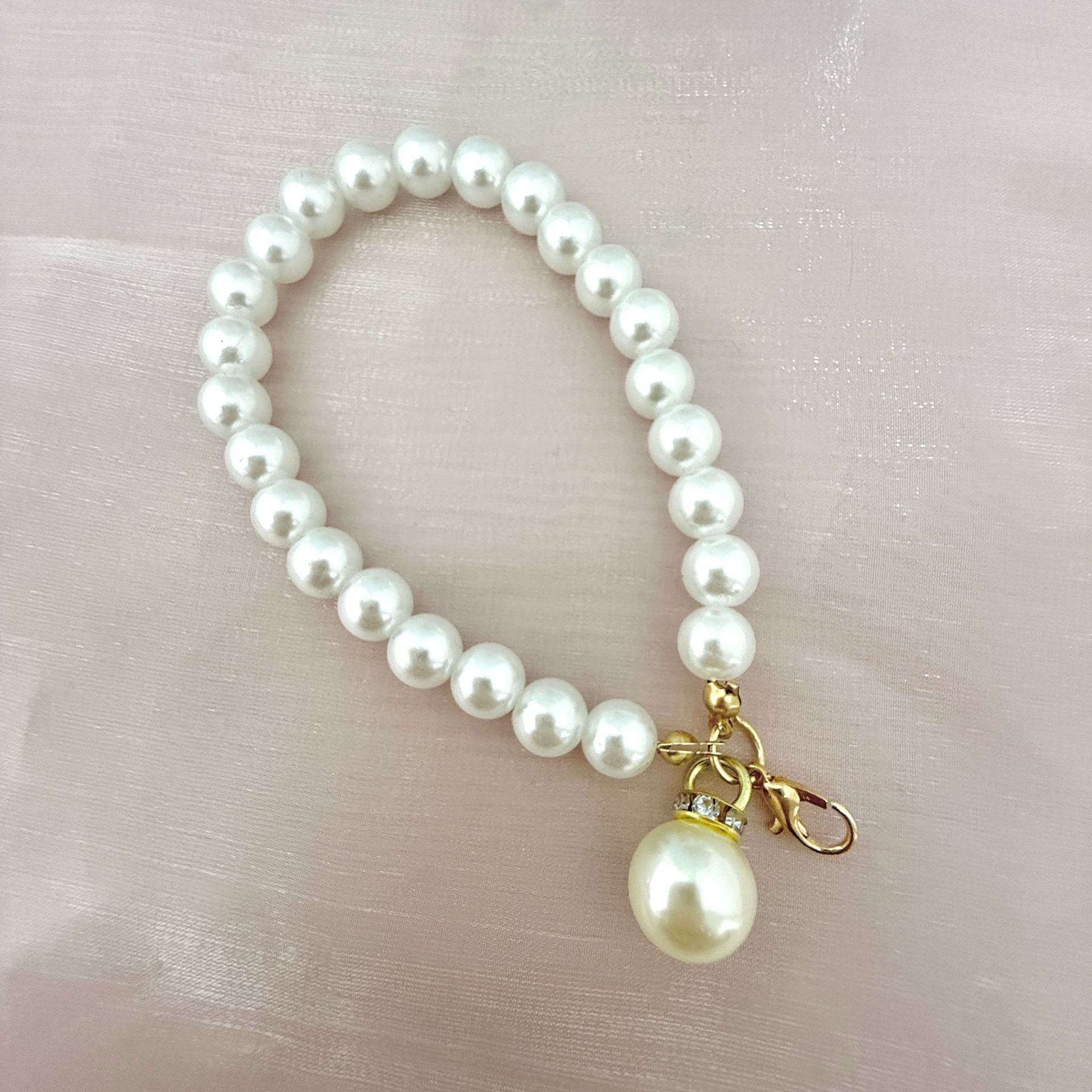 Nuevo amor creativo pulsera llavero colgante colgante accesorios de perlas joyas rojas en línea al por mayor