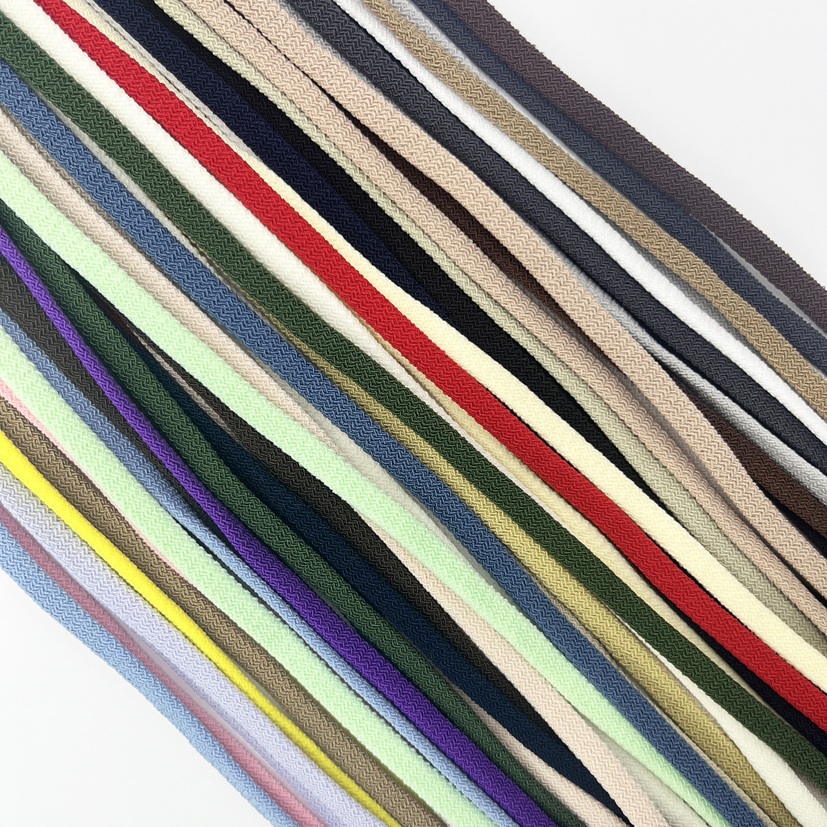 34 colores en stock 6 / 8mm color de alta elasticidad ondulado hueco cordón de goma hueco de doble capa de color sólido cordón elástico hueco