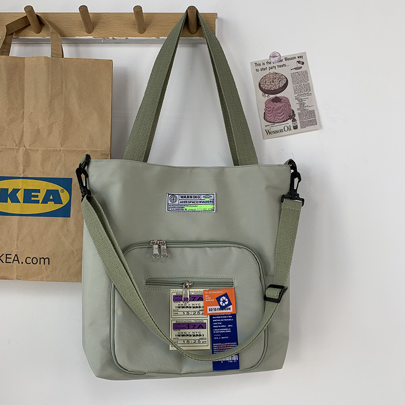 Nueva crossbody bolsa de lona de las mujeres de hombro de gran capacidad portátil estudiante moda nylon bolsa de lona bolsa de viaje bolsa