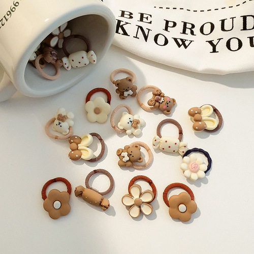 Candy-colored children's cute little bear rubber band flower hair band baby does not hurt the hair and has good elasticity for girls and babies.