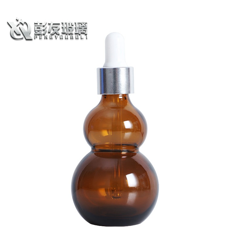 厂家供应现货茶色玻璃瓶20ml双葫芦型分装瓶滚珠头滴管精油瓶