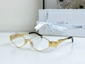 Gold frame, clear lens
