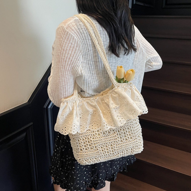 Versión coreana del bolso de nicho 2025 verano nuevo bolso femenino estilo pastoral bolso de punto bolso de hombro de encaje