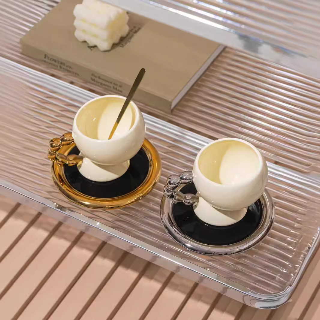 Creativo y lujoso estilo nórdico blanco y negro taza de plato taza de marca taza de café de cerámica taza de alto valor de la cara taza de mango galvanizado