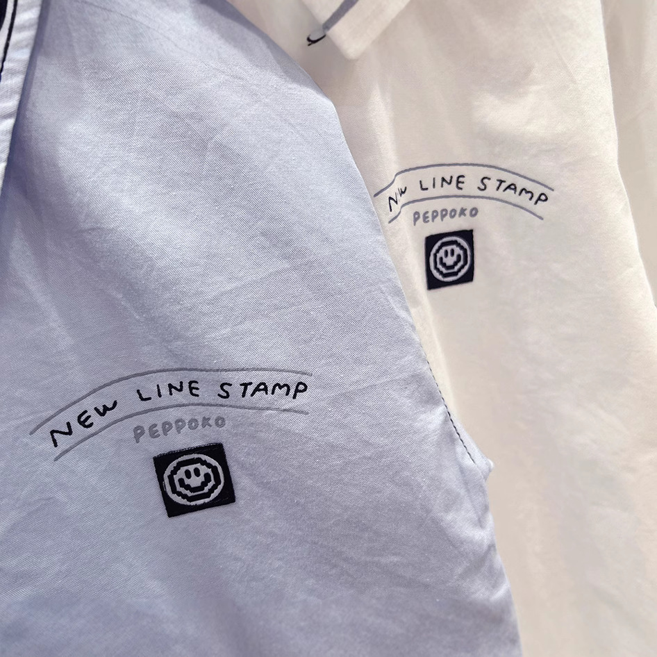 Camisa de manga larga para niños primavera 2024 Nueva camisa de letra cardigan de manga larga para bebés y niños