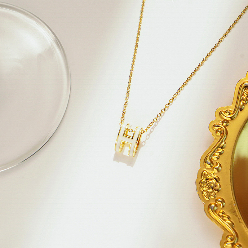 Gold and white necklace