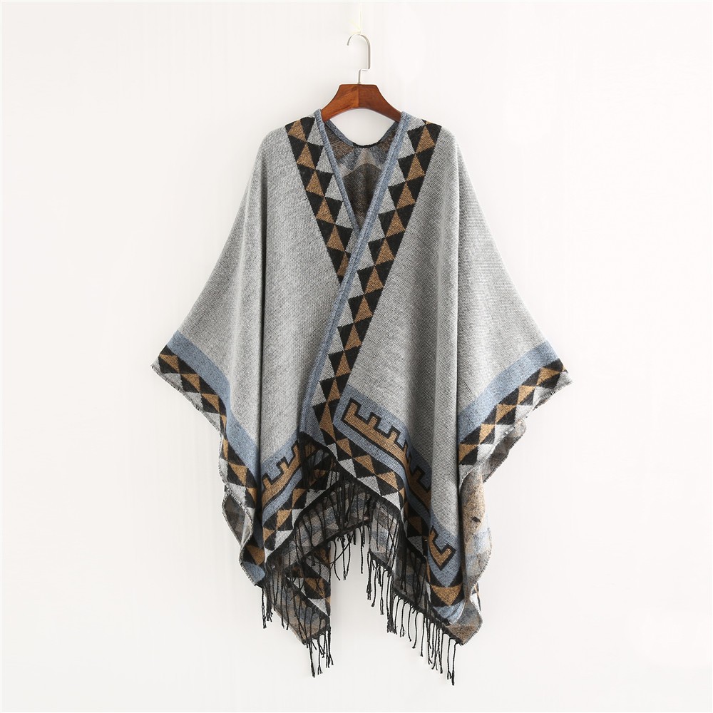 El estilo nacional tibetano Yunnan turístico vestido con una capa de moda universal gruesa bufandas cálidas a prueba de viento