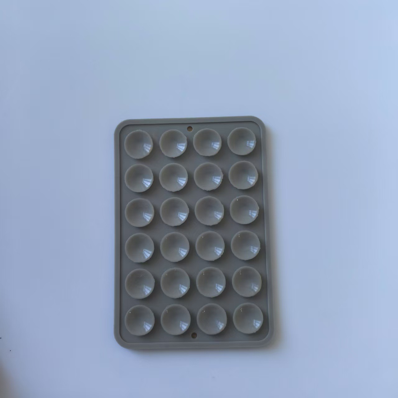 Funda de silicona antideslizante con ventosas para teléfono, 24 piezas en stock, soporte portátil móvil para teléfono, cuadrado, de silicona de una sola cara.