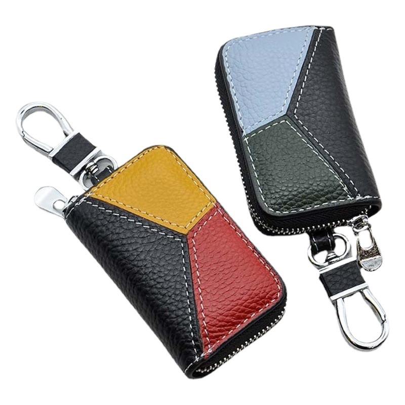 車のリモコンの車のスプーンの包みの頭の層の牛革の通用のチェーンの通用するキーのカバンの工場は卸売りします。