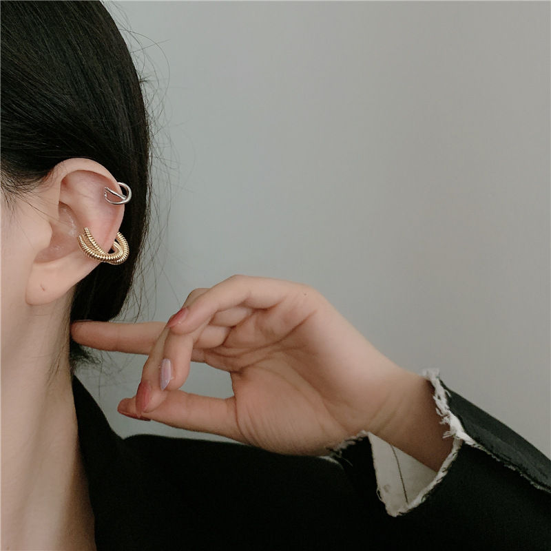 Fashion Geometric Cross Metal Winding Alloy Earrings Wholesale display picture 15