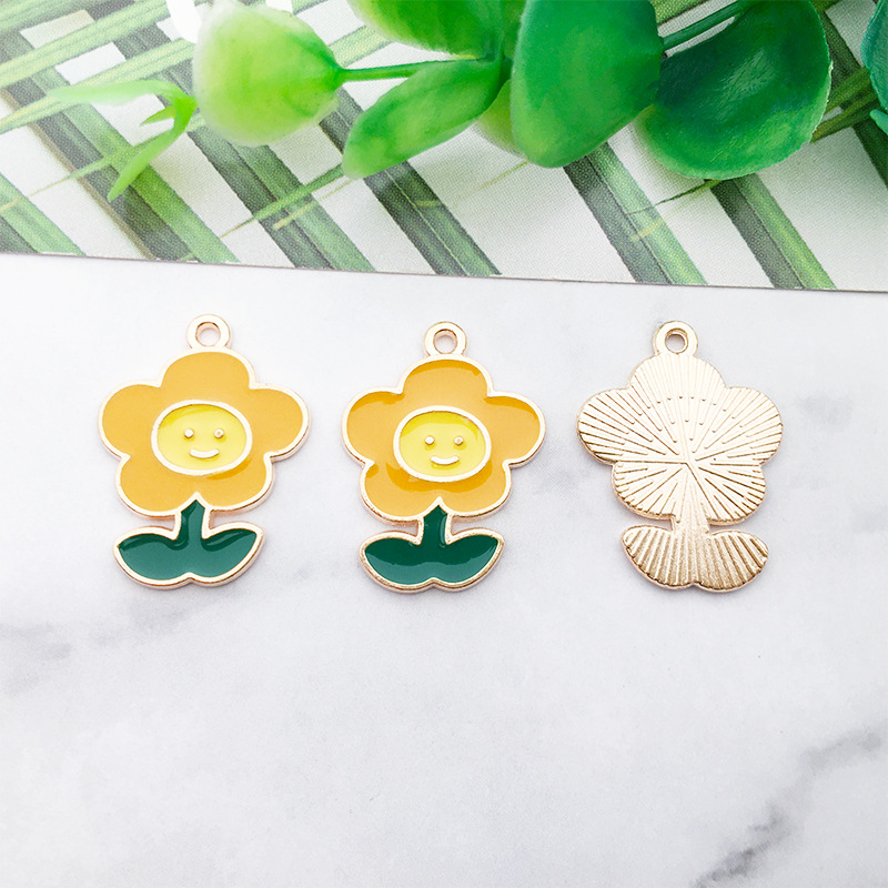 1 gota de aceite flor girasol DIY joyería accesorios aleación color flor collar pendientes colgante estilo coreano