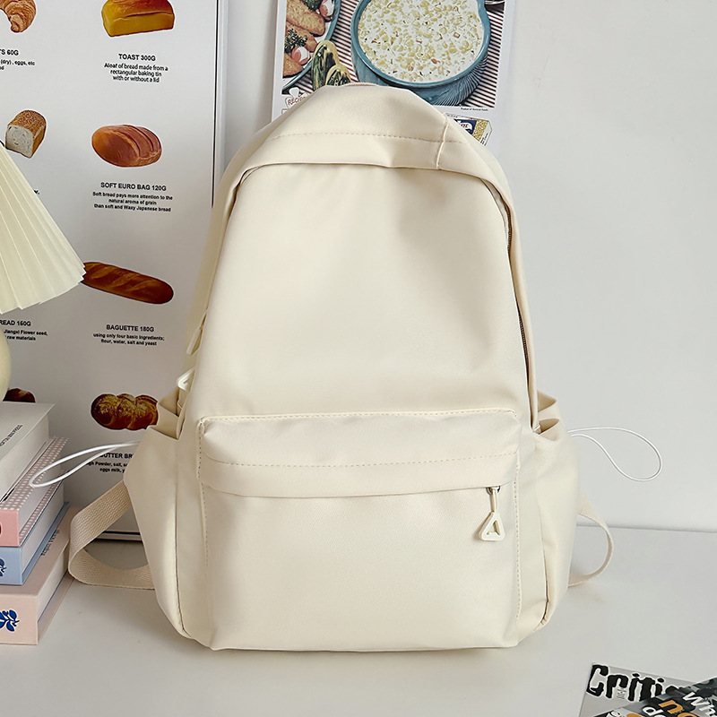 Mochila de gran capacidad para estudiantes de secundaria femenina simple y versátil para estudiantes de secundaria japonesa mochila de diseño