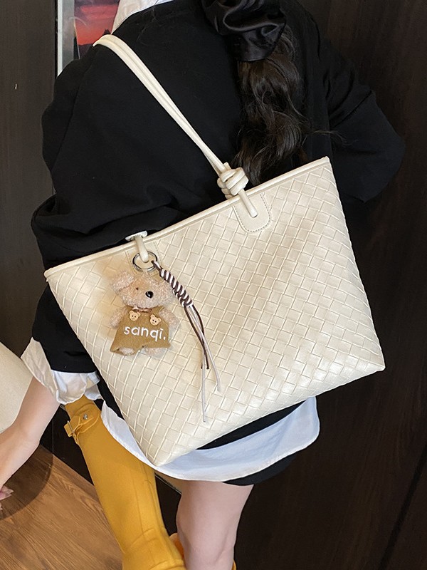 Bolso de patrón tejido de gran capacidad Bolso de hombro de cercanías de moda transfronteriza para mujer Bolso de tote de todo fósforo casual de alta gama