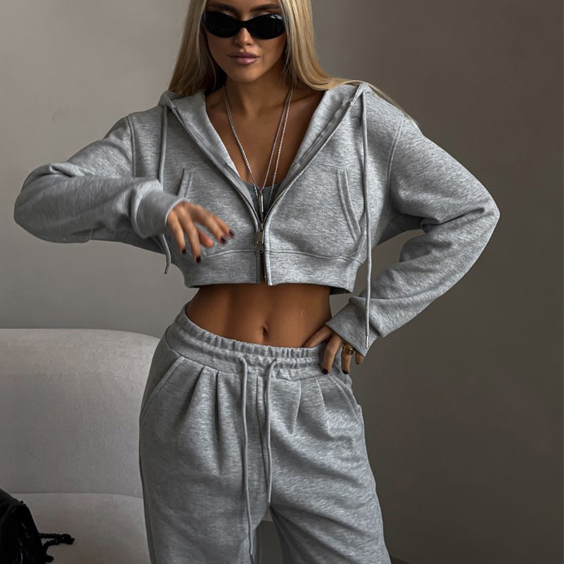 European and American Amazon Autumn New Women's Casual suit Solid Color Short Waist-exposed Hooded Cardigan Lace-up Sports Pants