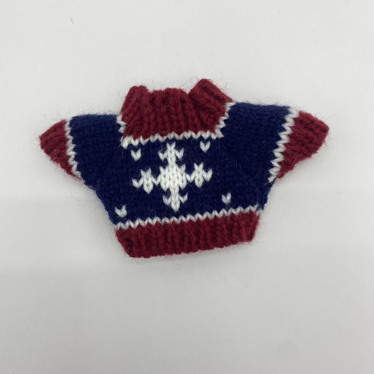 Dark blue sweater with dark red edges
