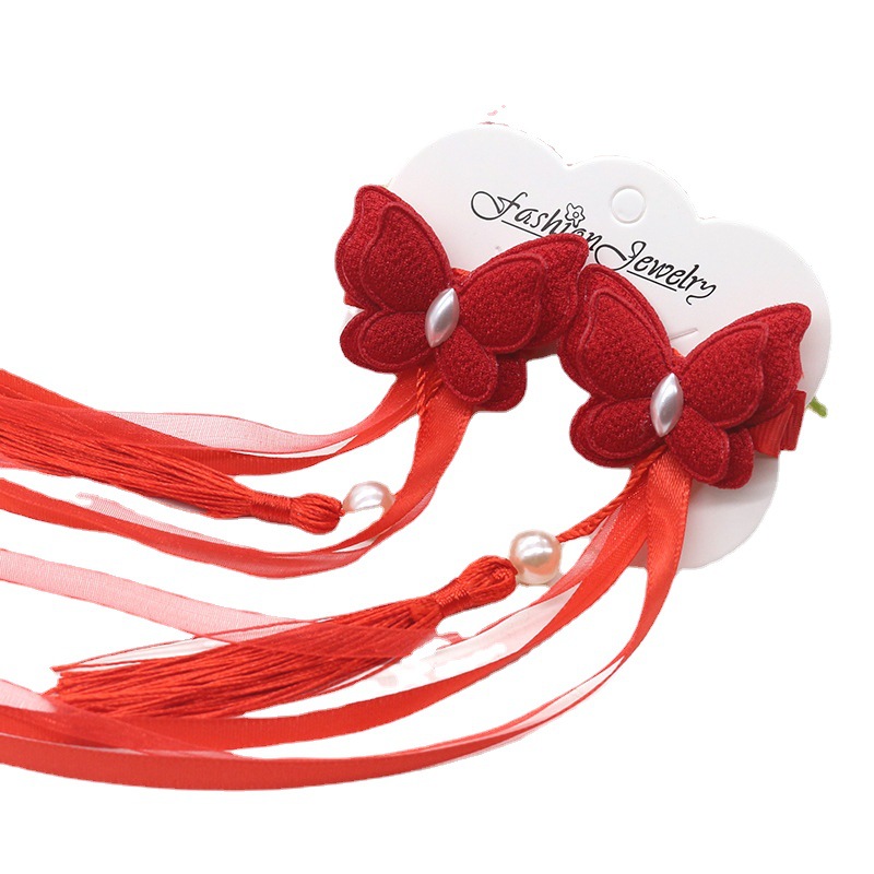 Children's hair accessory with tassels