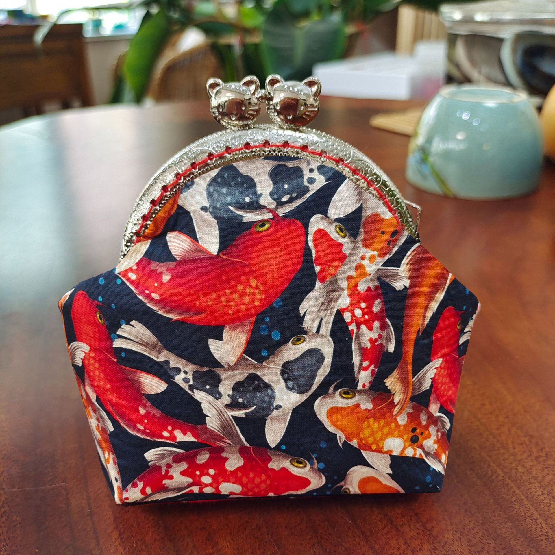 Bolsa de material de bordado bricolaje hecho a mano 8,5 boca Bolsa de Oro patchwork bolsa antigua bolsa transfronteriza inglés gato bolsa de almacenamiento