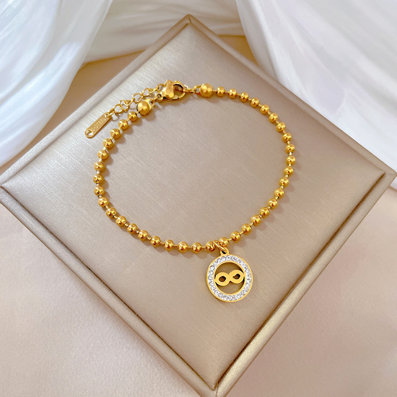 Bracciale donna con perline rotonde personalizzato in acciaio_voghion.com